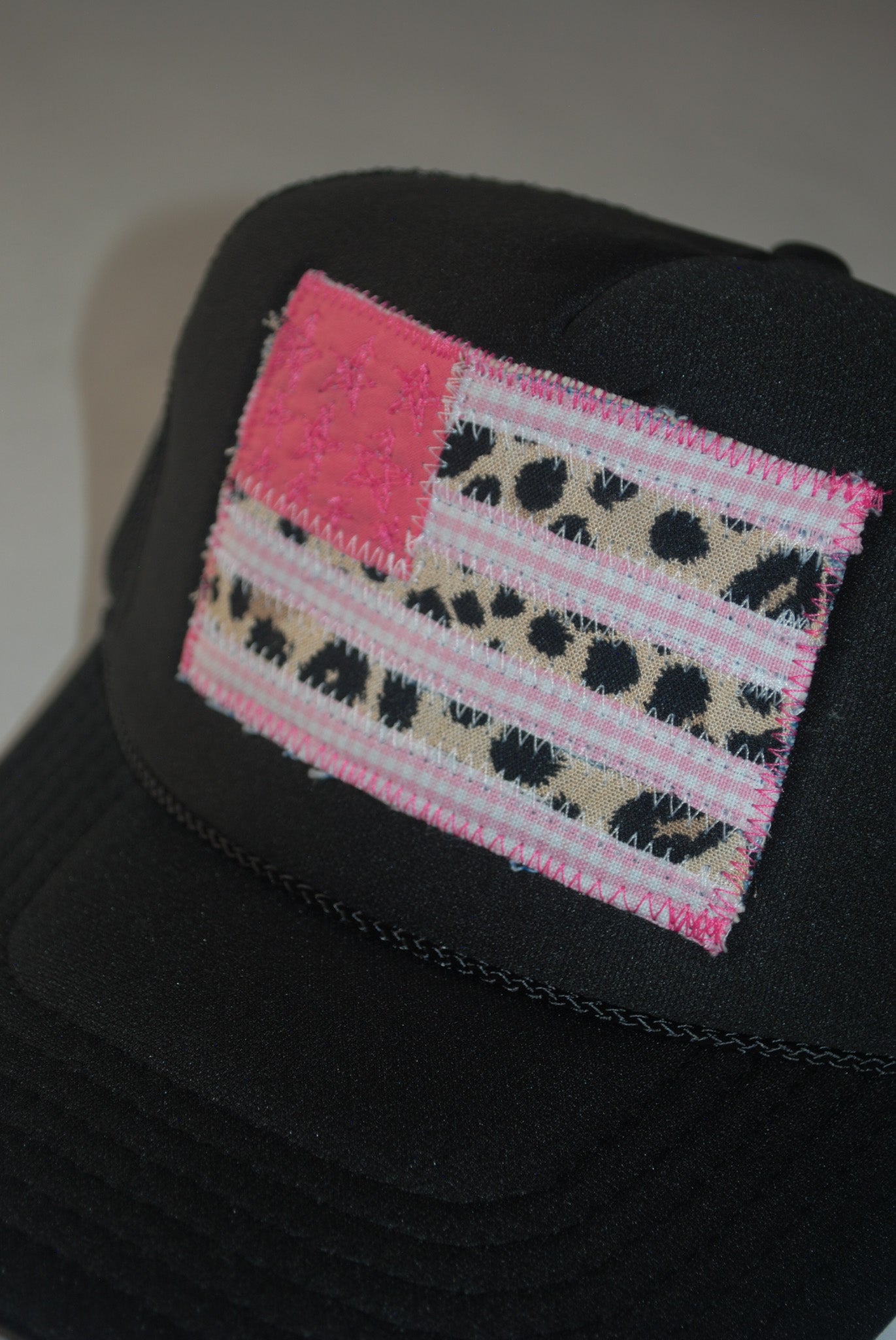 BLACK AMERICAN FLAG TRUCKER WITH CHEETAH & GINGHAM