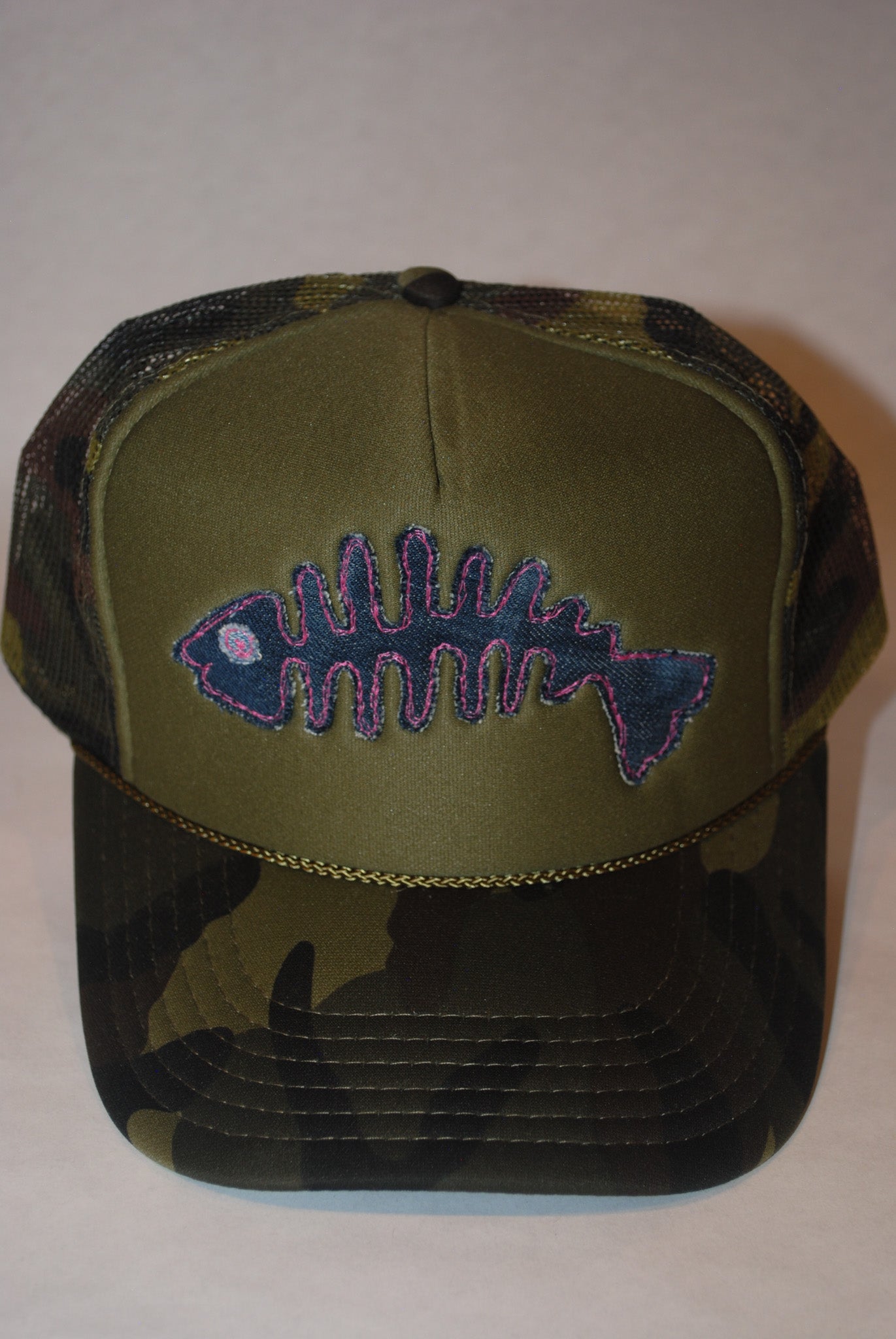 CAMO FISH SKELLY TRUCKER