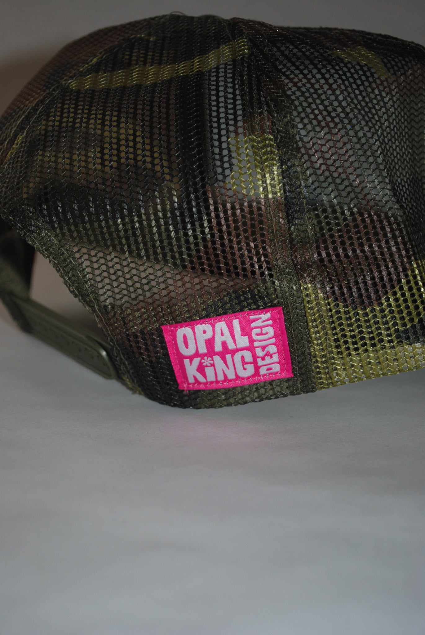 CAMO FISH SKELLY TRUCKER