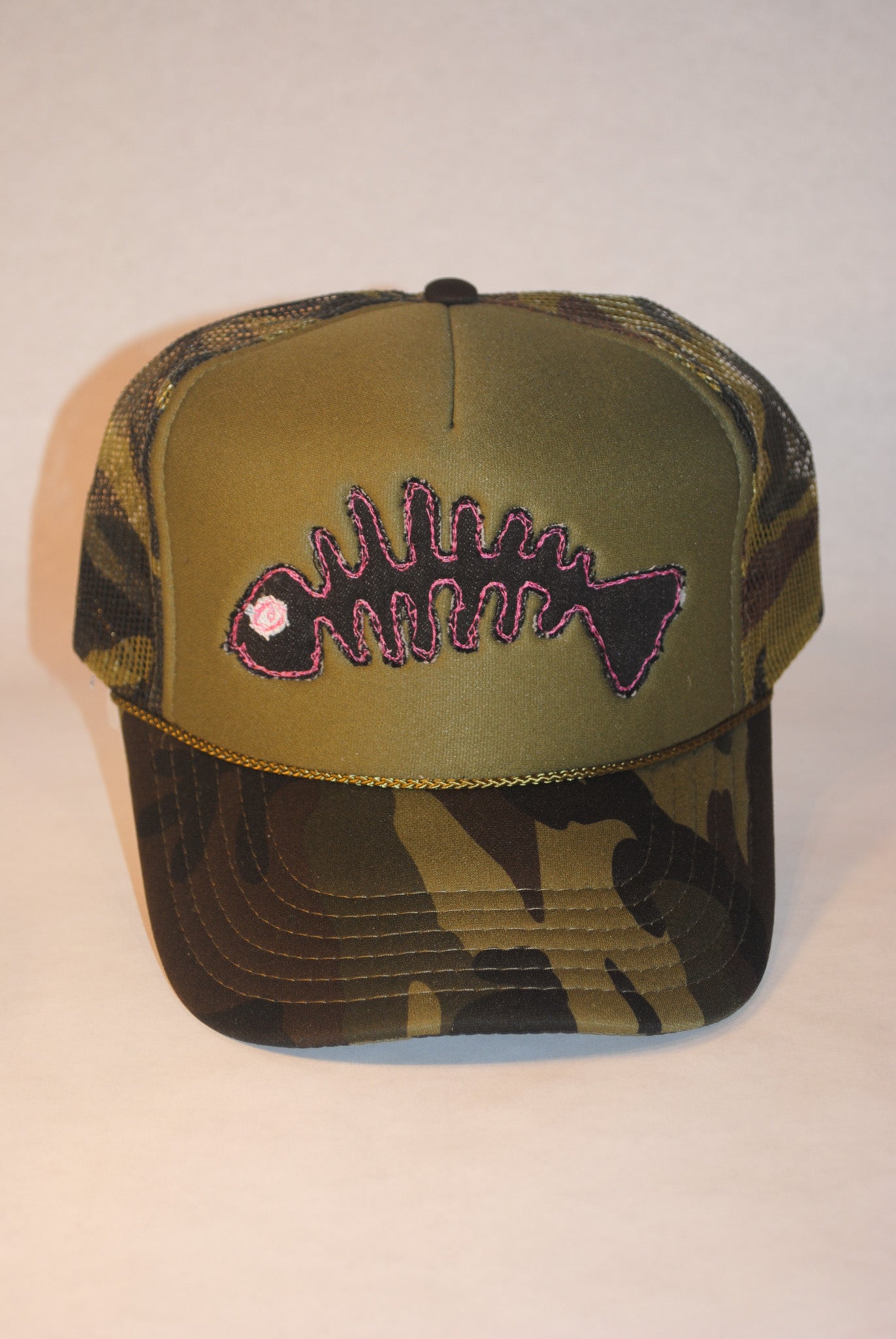 CAMO FISH SKELLY TRUCKER