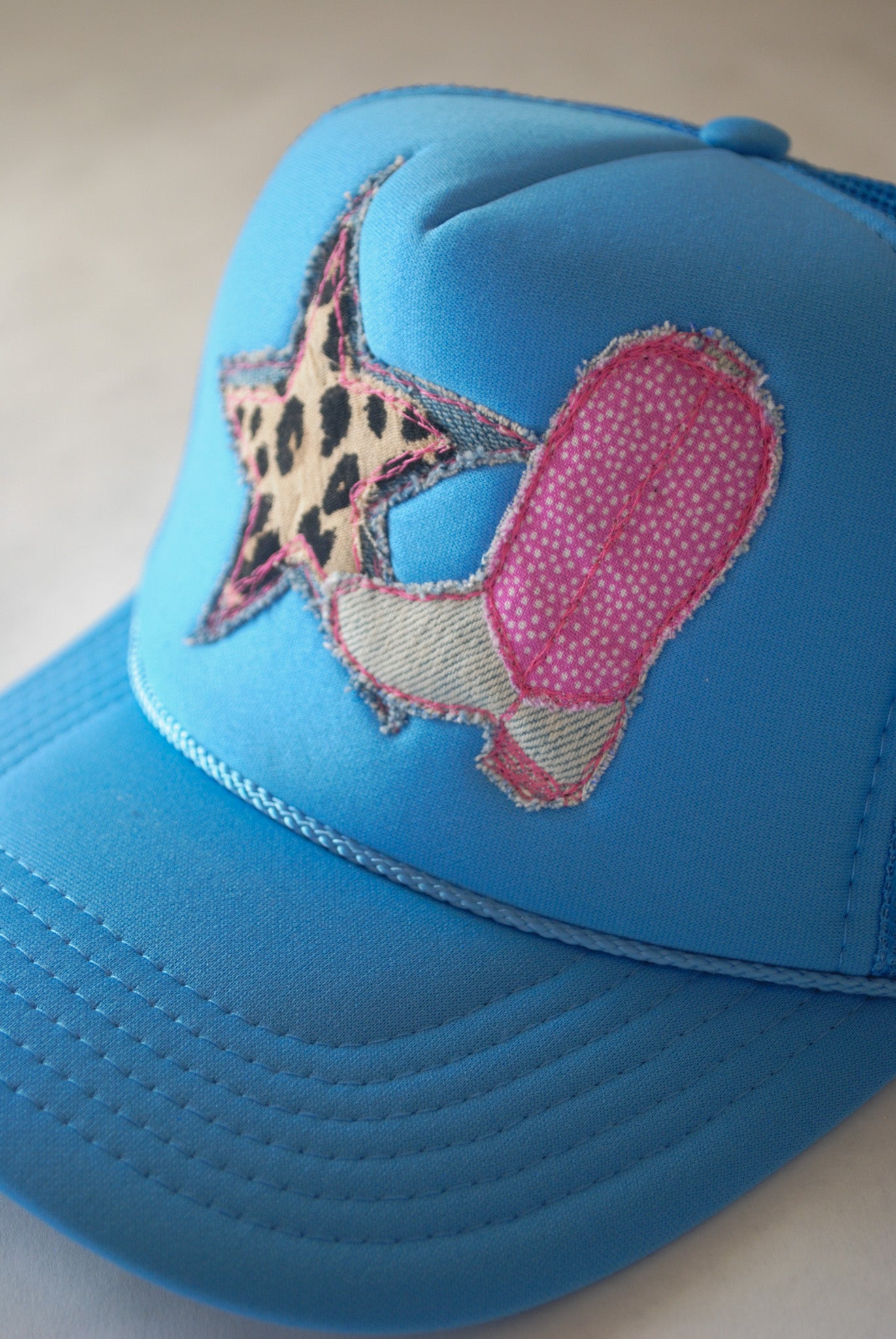 LIGHT BLUE COWGIRL STAR TRUCKER